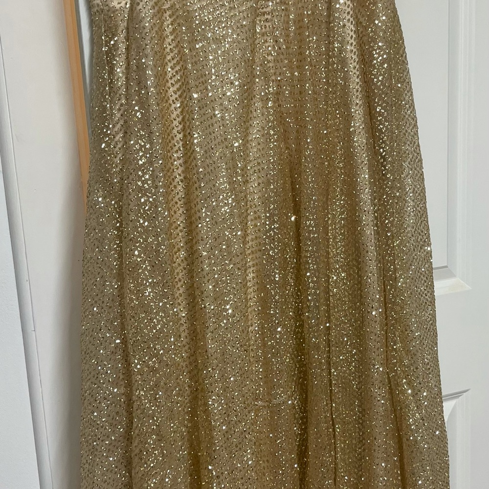Champagne color, my light messed with the color! Very beautiful dress!